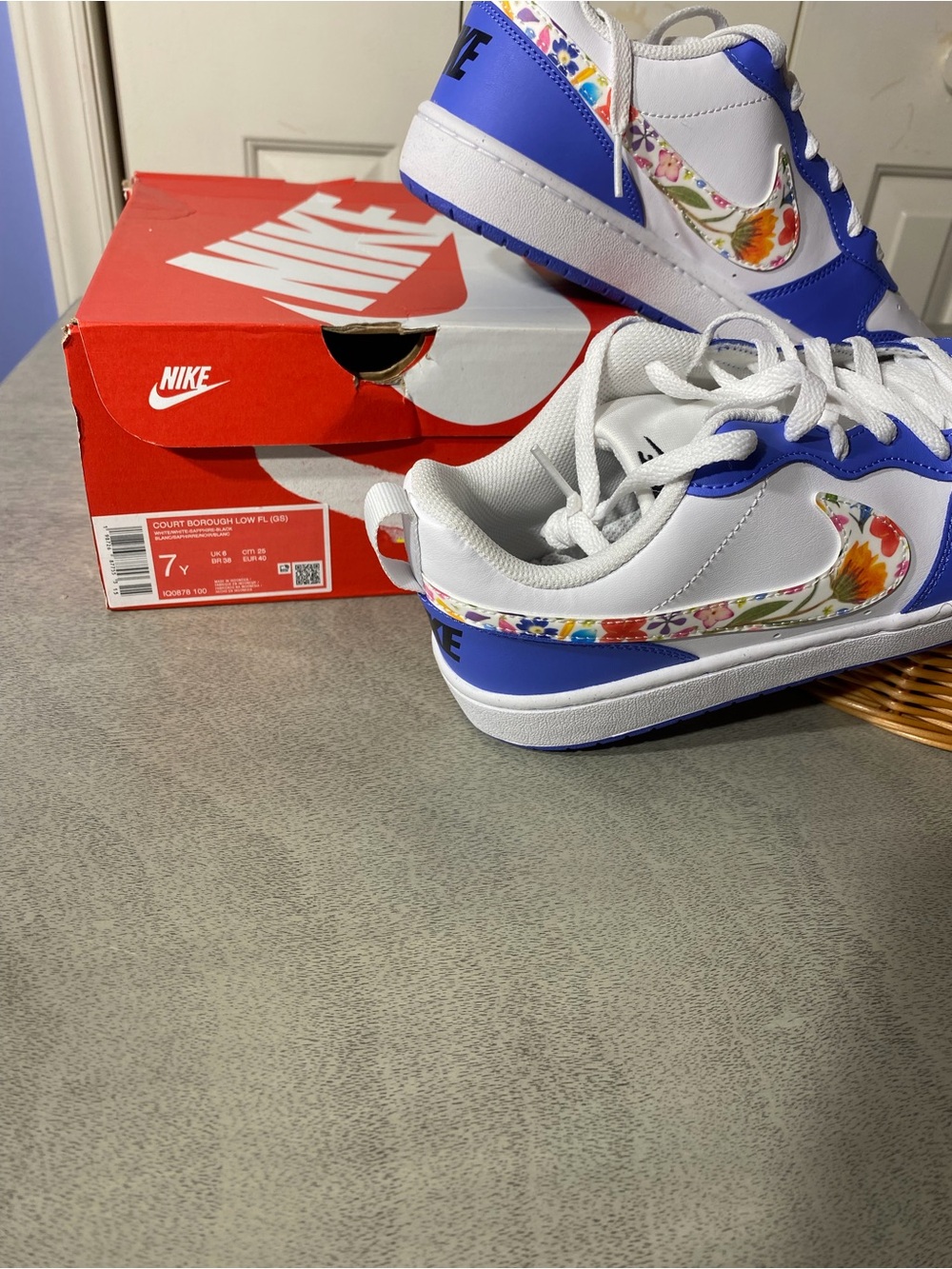 Nike Kids White and Blue Low-Top Sneakers with Floral Swoosh